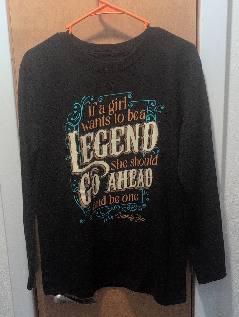 Women's Black Long-Sleeve Graphic Tee - 'If a Girl Wants to Be a Legend'
